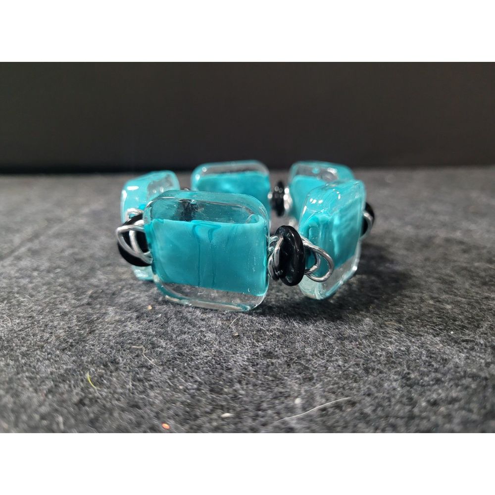 Diacroic Glass beaded stretch braclet.  Beautiful teal diacroric used with black
